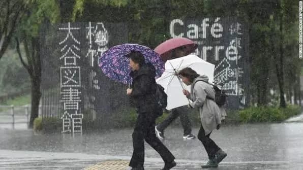 Severe Flooding Hits Western Japan as Two Tropical Storms Approach Region